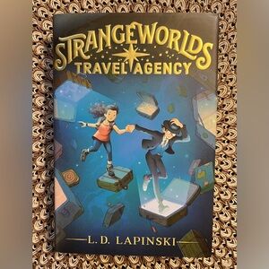Strangeworlds Travel Agency by L. D. Lapinski (2021, Hardcover)